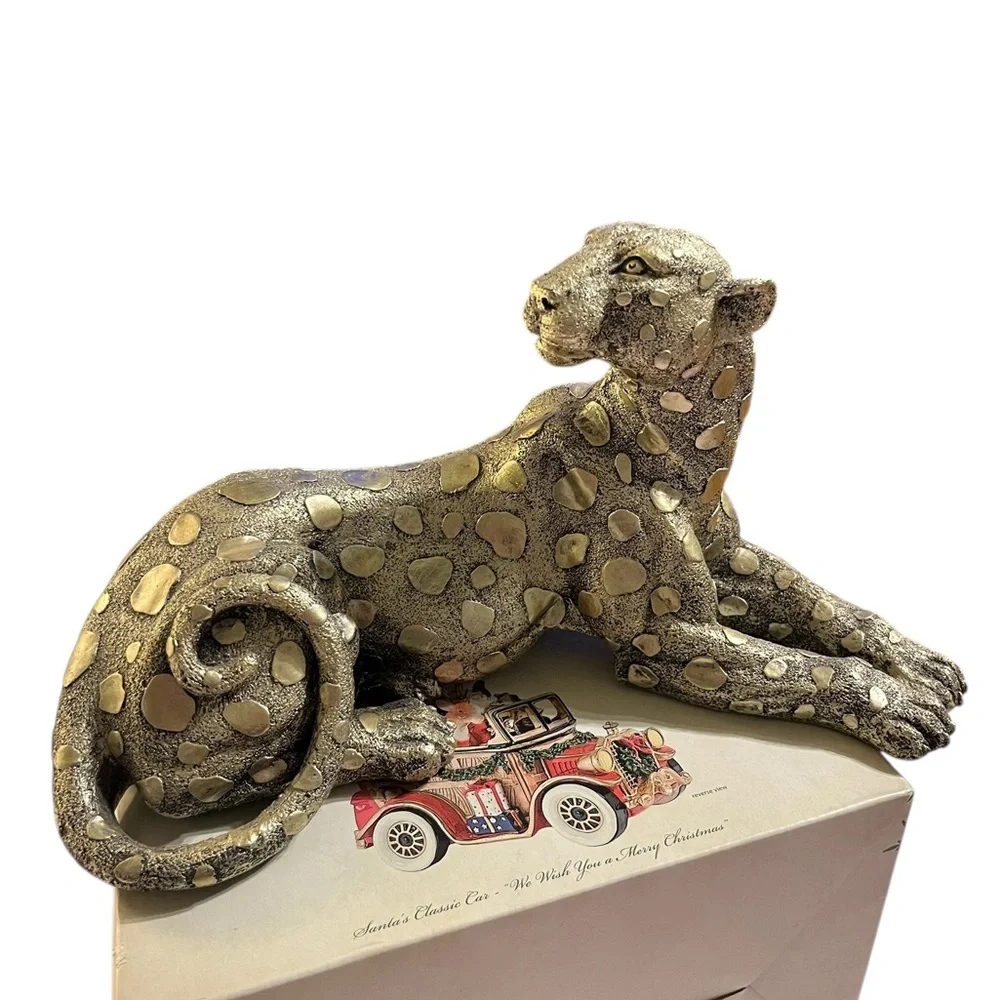 Leopard seated figurine